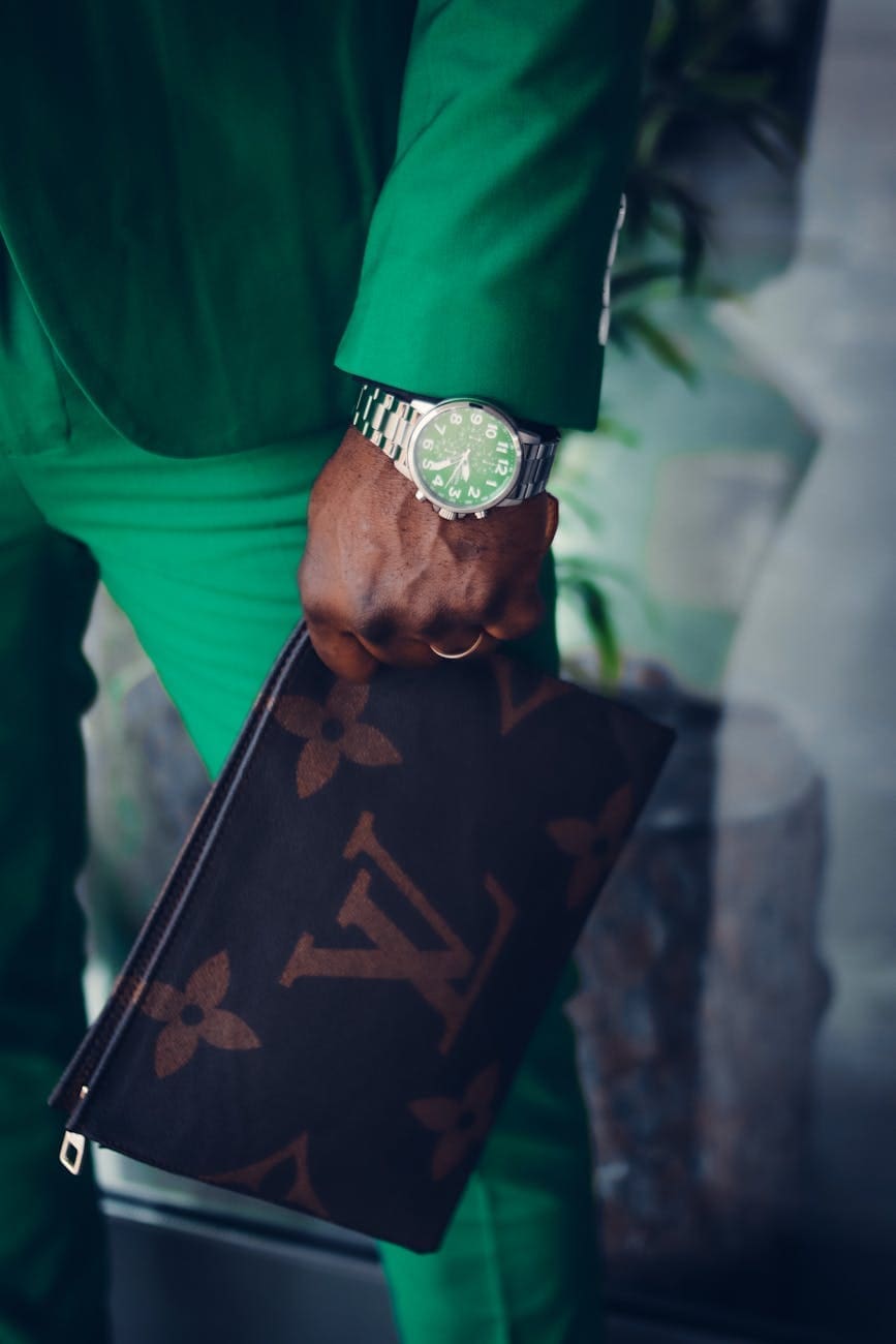 man holding a small bag