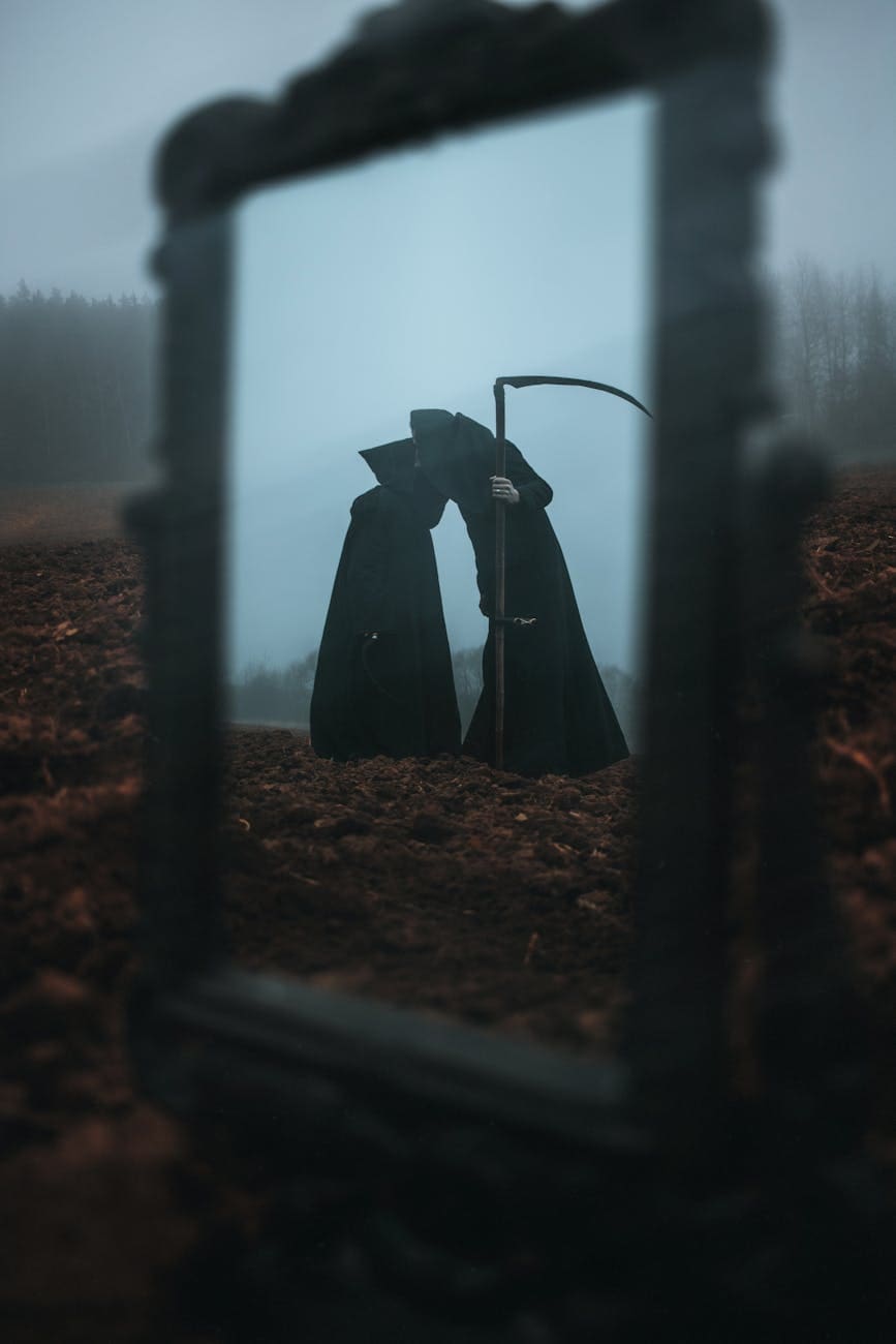 reflection of death like looking figures in a mirror