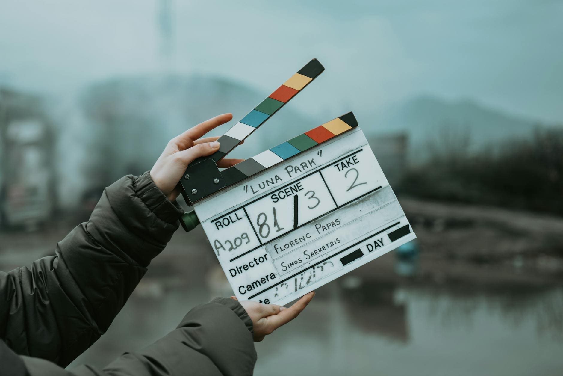 hands holding clapperboard