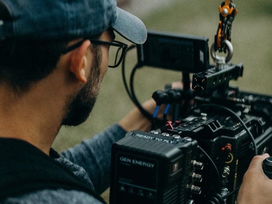 man holding video camera
