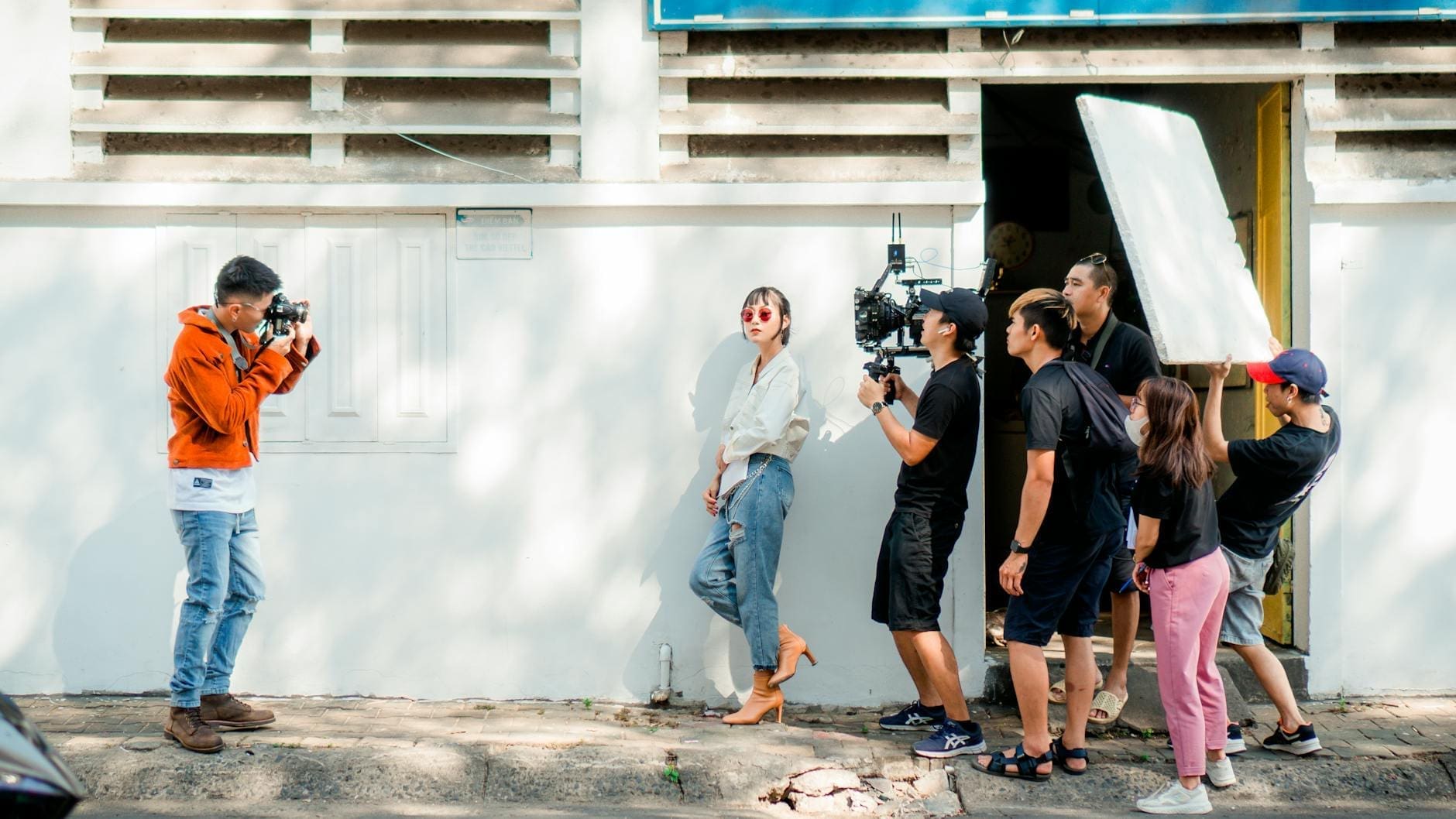 photo of people filming on set
