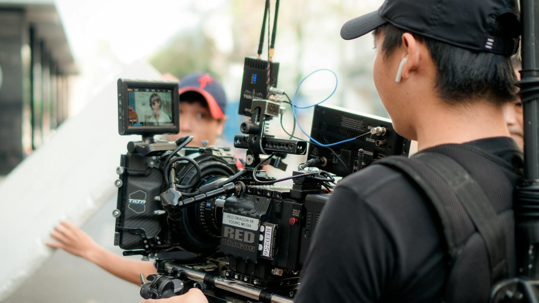 photo of person holding camera equipment
