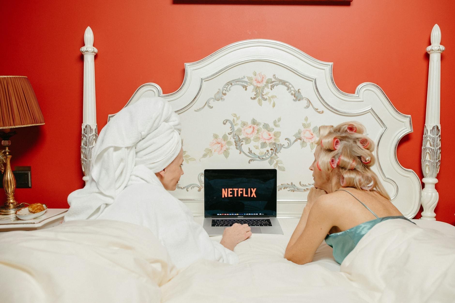 women watching on a laptop