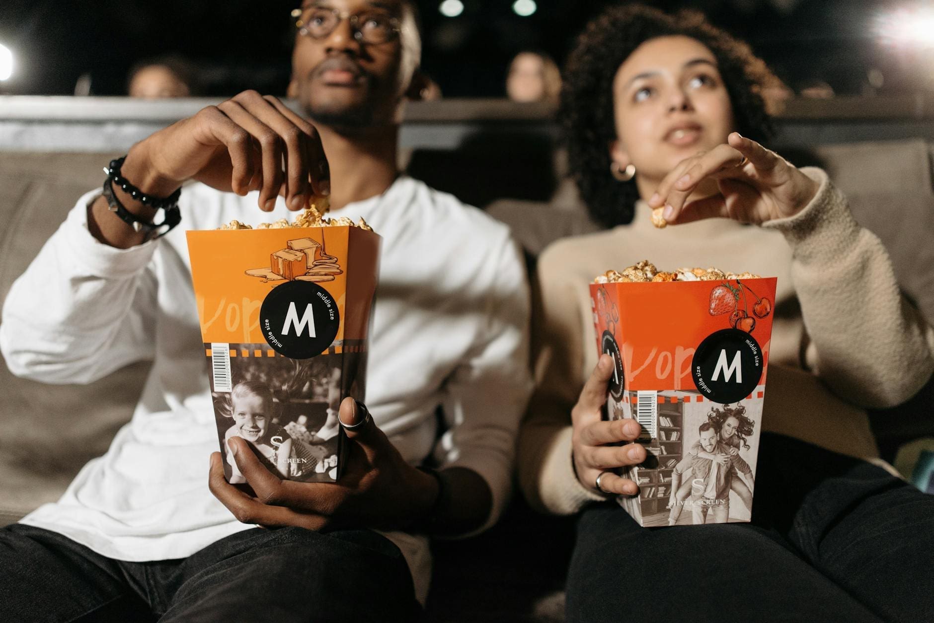 couple eating popcorn together