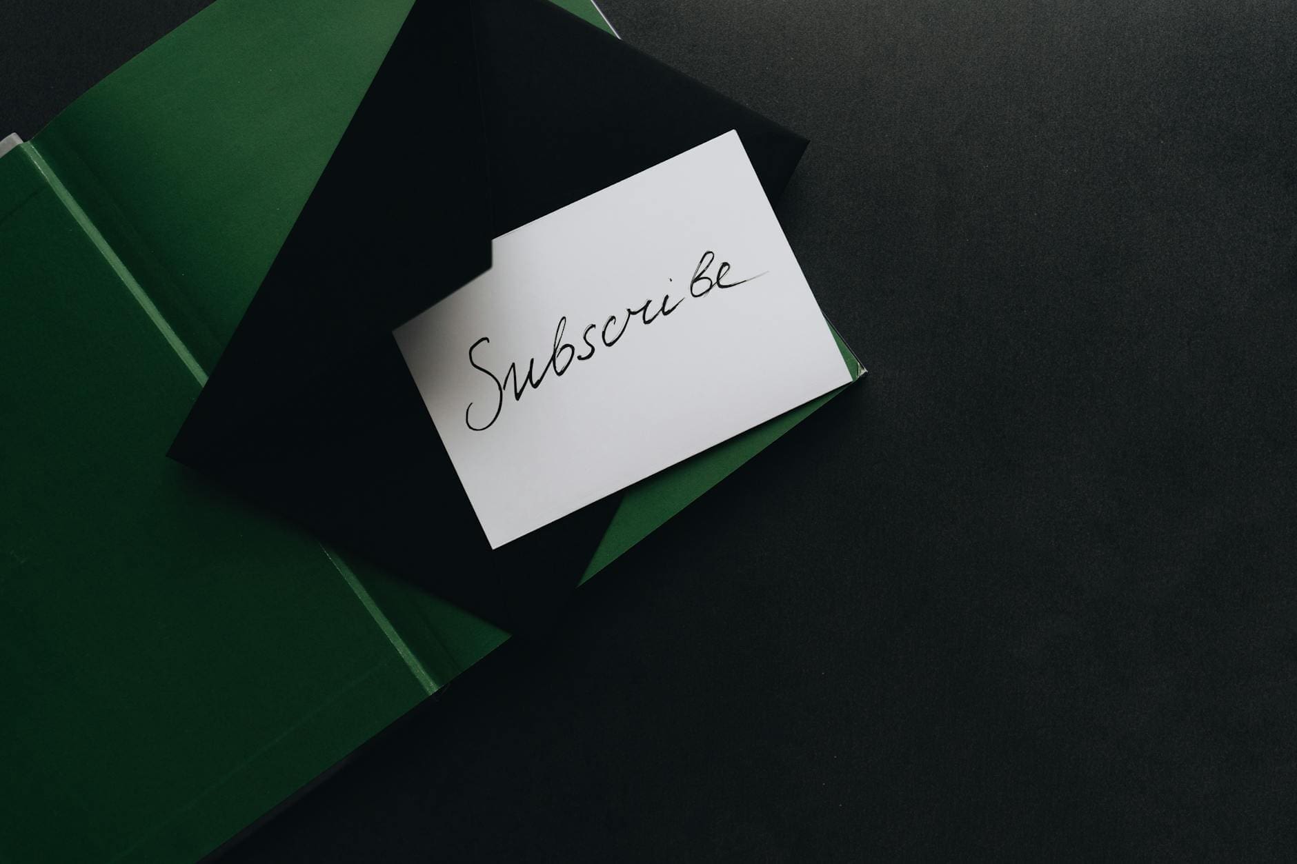 white card on top of an envelope