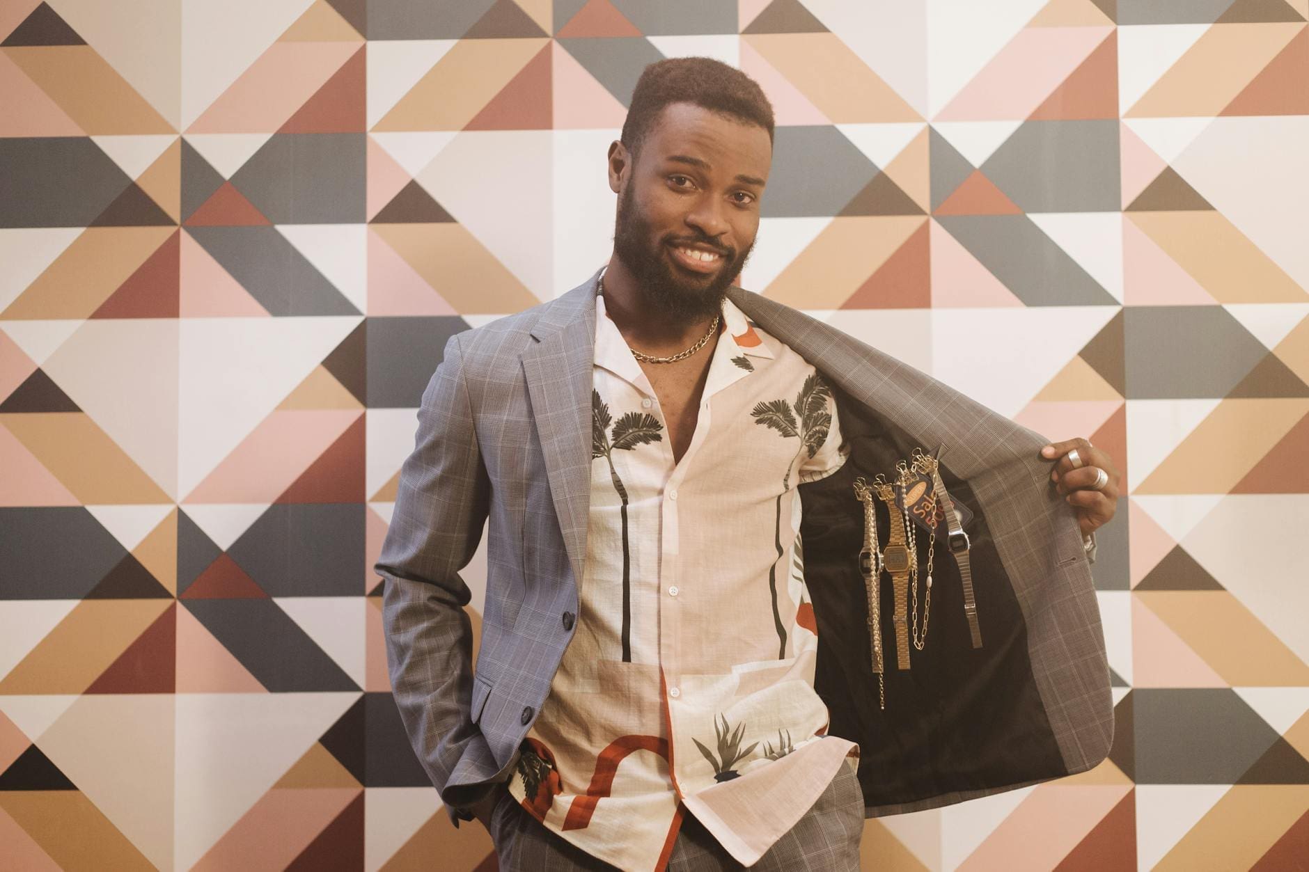 man with watches on his coat