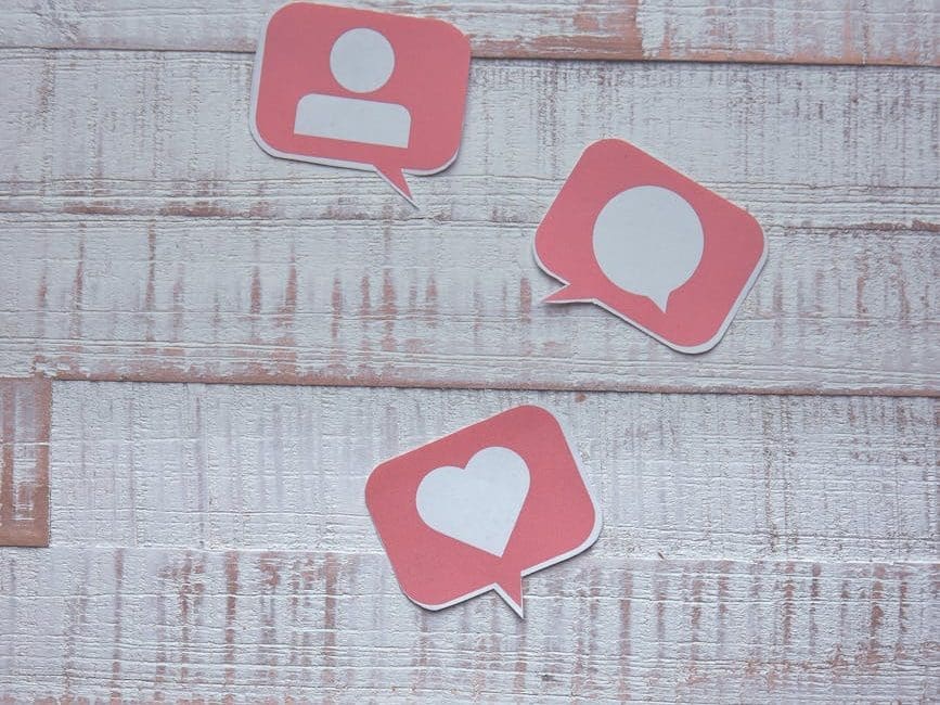 social media symbols and a cell phone