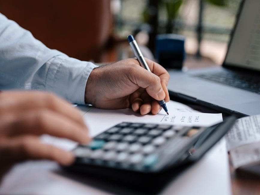 a person using a calculator