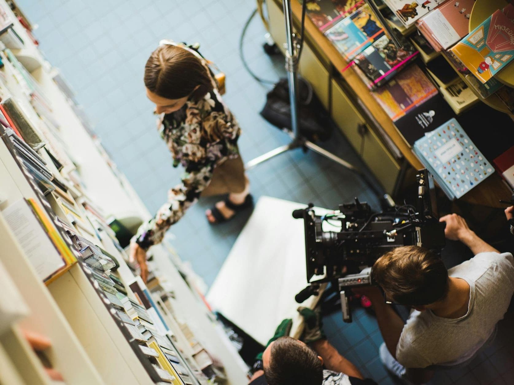 filming a woman at library